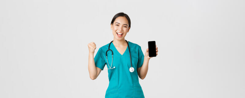 medicine-concept-successful-cheerful-asian-female-doctor-nurse-scrubs-fist